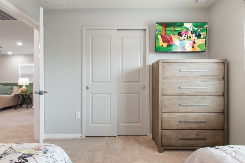 Wall mounted TV at the bedroom